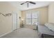 Cozy bedroom with a day bed and ceiling fan at 7302 Deer Crossing Ct, Sarasota, FL 34240