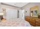 Bright bedroom with a double closet and ensuite bathroom at 7302 Deer Crossing Ct, Sarasota, FL 34240