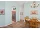 Dining area with wooden table and kitchen views at 7302 Deer Crossing Ct, Sarasota, FL 34240