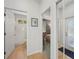 Hallway with bathroom and bedroom access at 7302 Deer Crossing Ct, Sarasota, FL 34240