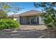 Single-story house with screened porch and backyard at 7302 Deer Crossing Ct, Sarasota, FL 34240