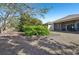 Single-story house with screened porch and backyard at 7302 Deer Crossing Ct, Sarasota, FL 34240