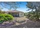 Single-story house, screened porch, and backyard at 7302 Deer Crossing Ct, Sarasota, FL 34240