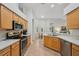 Eat-in kitchen featuring stainless steel appliances and ample counter space at 7302 Deer Crossing Ct, Sarasota, FL 34240