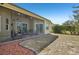 Spacious screened porch with seating area and ceiling fan at 7302 Deer Crossing Ct, Sarasota, FL 34240