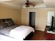 Bright bedroom with a double bed and hardwood floors at 800 S Dakota Ave # 329, Tampa, FL 33606