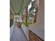 Inviting front porch with brick columns and white railing at 8030 Hampton Lake Dr, Tampa, FL 33647