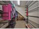 Functional walk-in closet with ample shelving and storage space for clothes and accessories at 8030 Hampton Lake Dr, Tampa, FL 33647