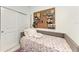 Small bedroom with daybed and pegboard wall at 8250 Velda Trl, Sarasota, FL 34241