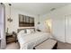 Spacious Primary bedroom with ensuite bathroom access and modern decor at 8250 Velda Trl, Sarasota, FL 34241