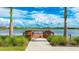 Scenic lake view from the community dock, featuring a tranquil escape for residents at 8250 Velda Trl, Sarasota, FL 34241