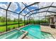 Relaxing screened pool and spa with spacious patio area at 8250 Velda Trl, Sarasota, FL 34241