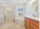 Bathroom features a soaking tub, shower, and double vanity at 8368 Miramar Way # 21, Lakewood Ranch, FL 34202