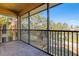 Screened balcony overlooking a golf course and pond at 8368 Miramar Way # 21, Lakewood Ranch, FL 34202