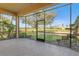 Spacious screened porch overlooking a golf course at 8368 Miramar Way # 21, Lakewood Ranch, FL 34202