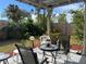 Relaxing backyard patio with seating area at 8585 Cristobal Avenue, North Port, FL 34287