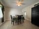 Dining room with a table set for four and access to outdoor space at 8585 Cristobal Avenue, North Port, FL 34287