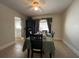 Dining room with table, chairs and green tablecloth at 8585 Cristobal Avenue, North Port, FL 34287