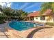 Relaxing kidney-shaped community pool at 936 La Costa Cir # 4, Sarasota, FL 34237