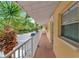 Building hallway with access to individual units at 936 La Costa Cir # 4, Sarasota, FL 34237