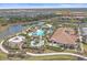 Aerial view showing resort-style pool and clubhouse at 5341 Greenbrook Dr, Sarasota, FL 34238