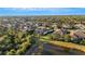 Aerial view of homes and pond, showcasing the community and landscape at 5341 Greenbrook Dr, Sarasota, FL 34238