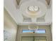 High ceiling entry with chandelier and recessed lighting at 5341 Greenbrook Dr, Sarasota, FL 34238