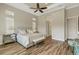 Luxurious main bedroom featuring hardwood floors and natural light at 5341 Greenbrook Dr, Sarasota, FL 34238