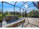 Tranquil water feature with a cascading waterfall and tiled accents at 5341 Greenbrook Dr, Sarasota, FL 34238