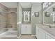 Elegant bathroom with double vanity and walk-in shower at 10315 Cortez W Rd # 5H, Bradenton, FL 34210