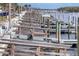 Wooden boat docks lining the water at 10315 Cortez W Rd # 5H, Bradenton, FL 34210