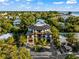 Luxury home with a metal roof, pool, and ocean views at 107 Maple Ave, Anna Maria, FL 34216