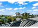 Stunning ocean view from a rooftop deck, showcasing blue skies at 107 Maple Ave, Anna Maria, FL 34216