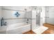 Bathroom with soaking tub and walk-in shower at 110 46Th St, Holmes Beach, FL 34217