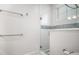 Bathroom with glass shower, modern fixtures, and neutral colors at 110 46Th St, Holmes Beach, FL 34217