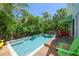 Private pool with deck and seating area at 110 46Th St, Holmes Beach, FL 34217