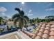 Balcony view of community with palm trees and homes at 1152 Beachcomber Ct # 15, Osprey, FL 34229