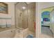 Large bathroom with a walk-in shower and soaking tub at 1152 Beachcomber Ct # 15, Osprey, FL 34229