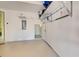 Garage with overhead storage and extra storage room at 1152 Beachcomber Ct # 15, Osprey, FL 34229