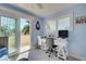 Home office with desk and window view at 1152 Beachcomber Ct # 15, Osprey, FL 34229