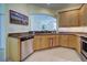 Kitchen with granite countertops and ample cabinet space at 1152 Beachcomber Ct # 15, Osprey, FL 34229