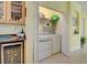 Laundry closet with washer and dryer at 1152 Beachcomber Ct # 15, Osprey, FL 34229