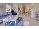 Open living area with views into kitchen and bathroom at 1152 Beachcomber Ct # 15, Osprey, FL 34229