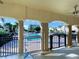 View of community pool from covered patio at 1152 Beachcomber Ct # 15, Osprey, FL 34229