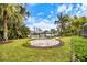 Backyard patio area with waterfront views of the private boat dock at 121 Holly Ave, Sarasota, FL 34243