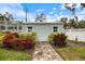 View of the backyard shed and chicken coop at 121 Holly Ave, Sarasota, FL 34243