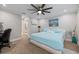 This primary bedroom features a ceiling fan, and ensuite bathroom at 121 Holly Ave, Sarasota, FL 34243