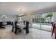 Bright dining room with a view of the pool at 121 Holly Ave, Sarasota, FL 34243