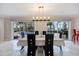 Dining room with a table and chairs overlooking the pool at 121 Holly Ave, Sarasota, FL 34243