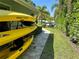 Dockside storage with a stack of yellow Ocean Kayaks ready for sunny adventures at 121 Holly Ave, Sarasota, FL 34243